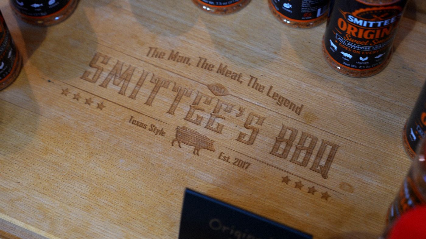 Engraved board reading The Man, The Meat, The Legend